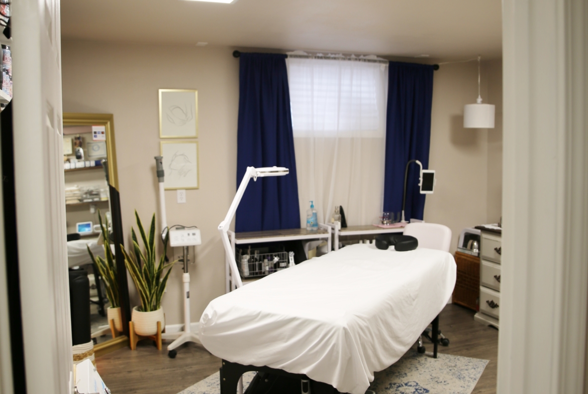 Comfortable salon treatment room with modern equipment and inviting decor.