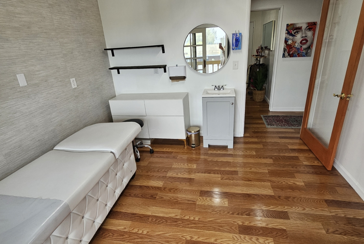 Bright, stylish salon rental with hardwood floors, modern decor, and essential amenities.