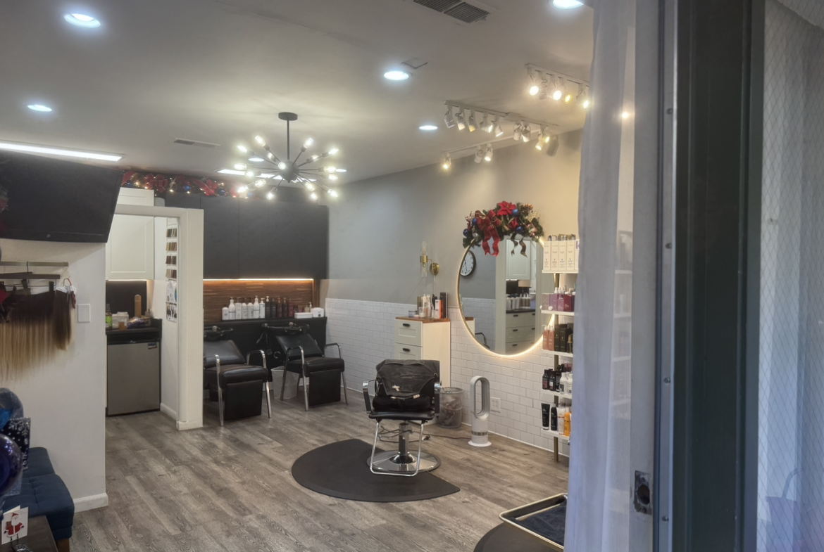 Modern salon with stylish decor and comfortable seating for clients.
