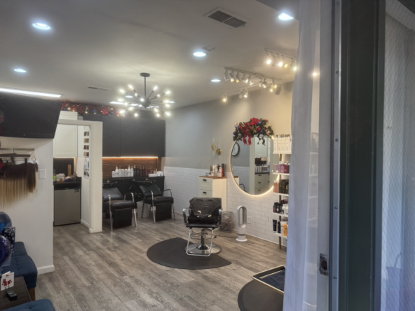 Modern salon with stylish decor and comfortable seating for clients.