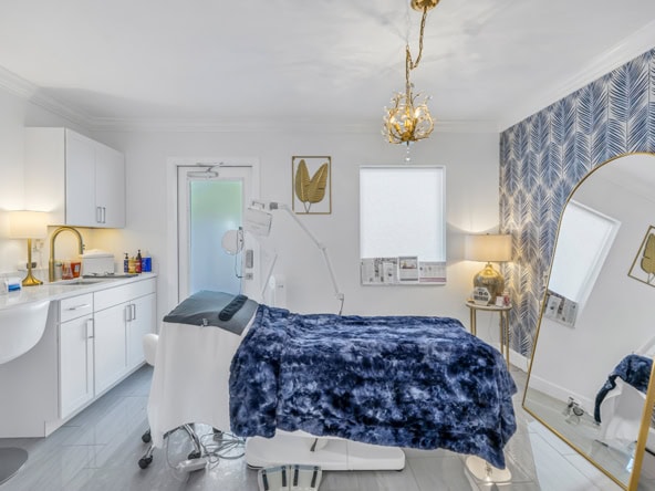 Salon Renter with treatment bed and modern decor.