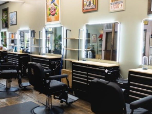 Bright, stylish salon with professional styling stations and mirrors.