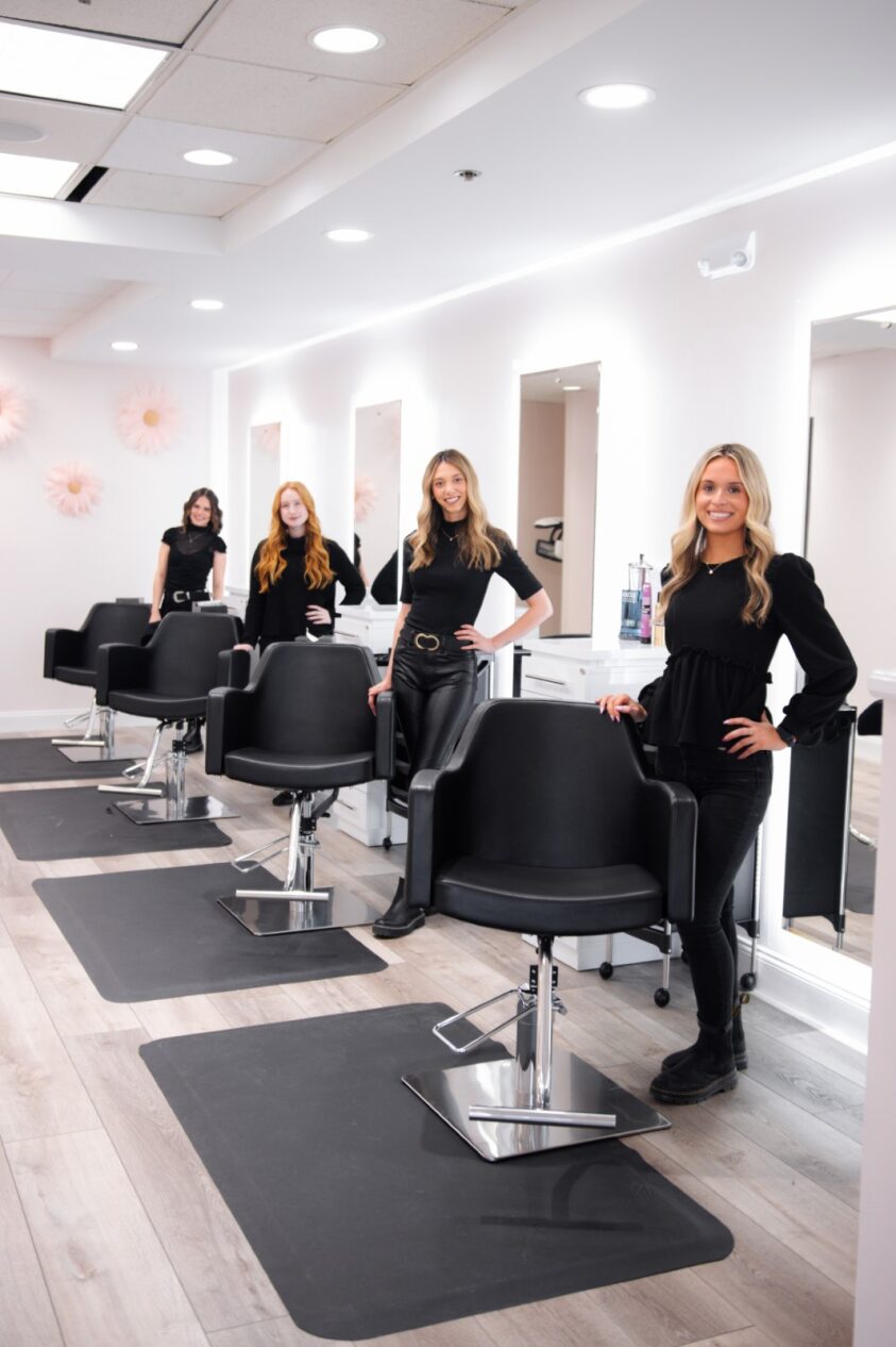 Modern salon styling chairs in a spacious, well-lit beauty salon. Perfect for hair salons and beauty professionals.
