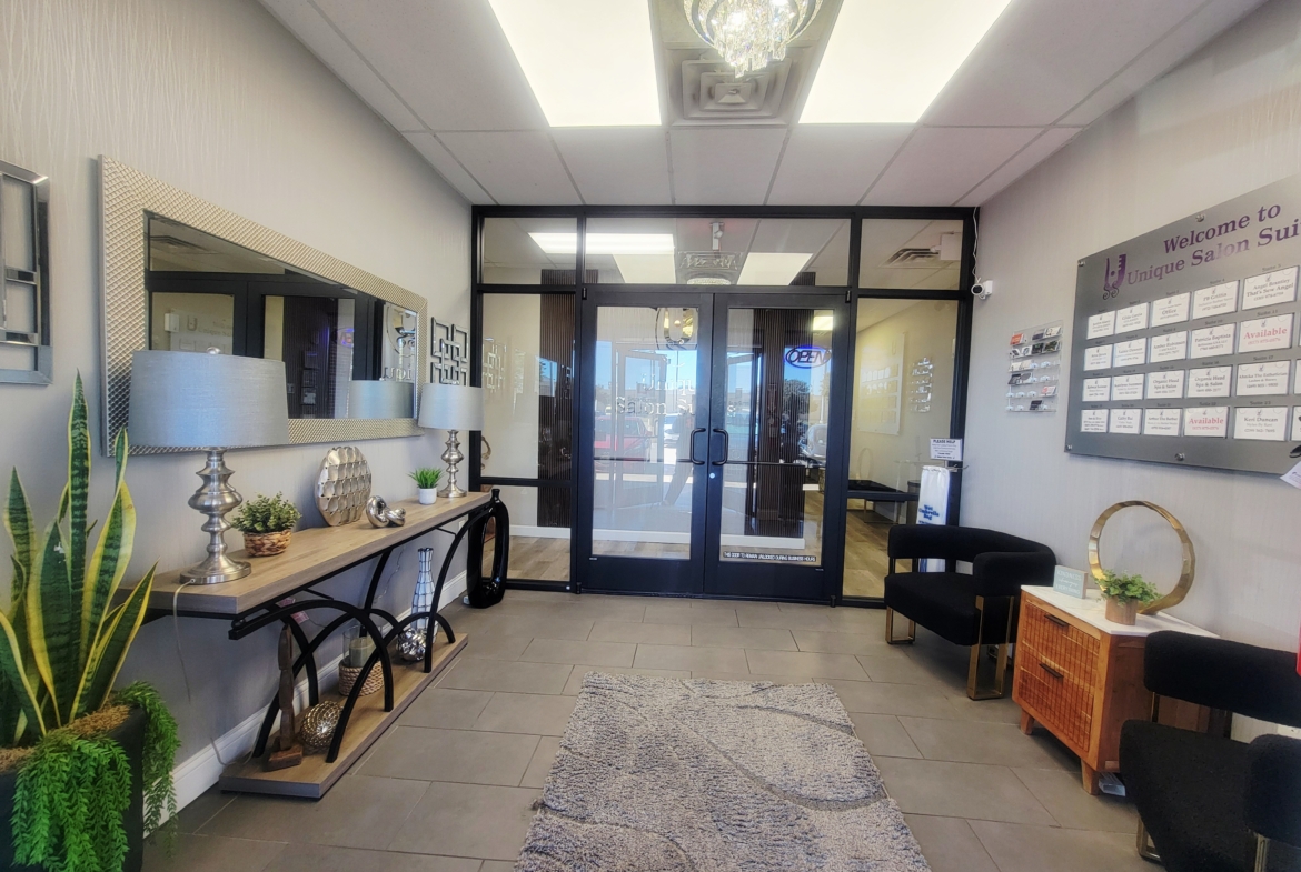 Inviting salon lobby with modern decor, seating area, and welcoming ambiance for clients.