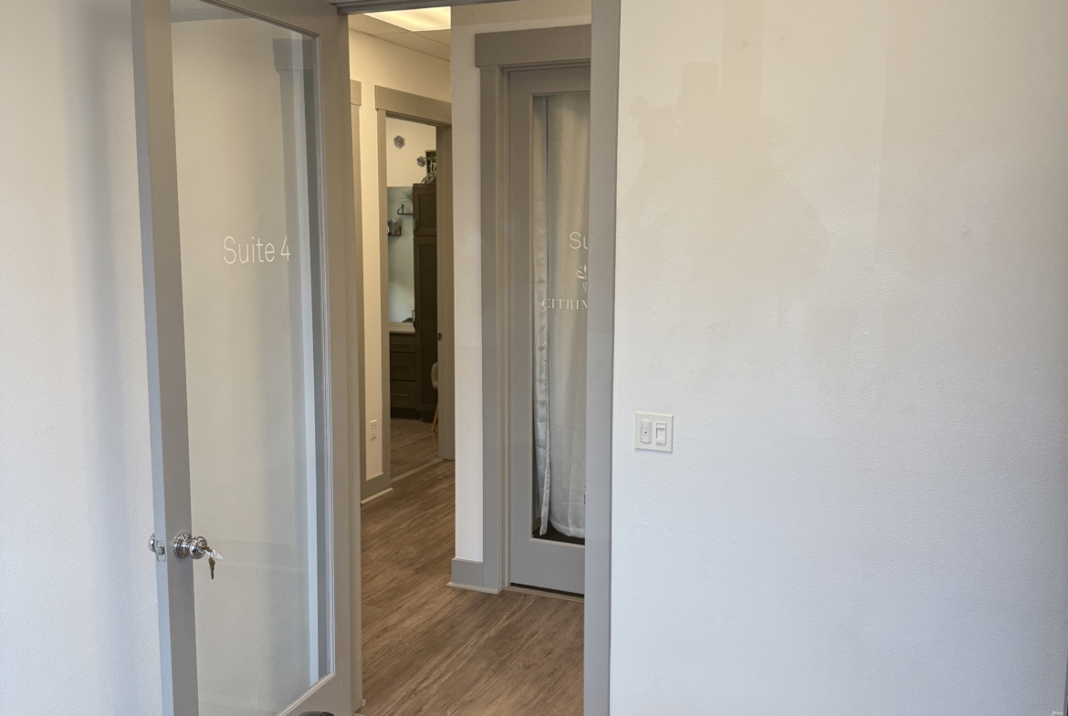 Bright, welcoming salon with private suites for hair, beauty, and wellness services.