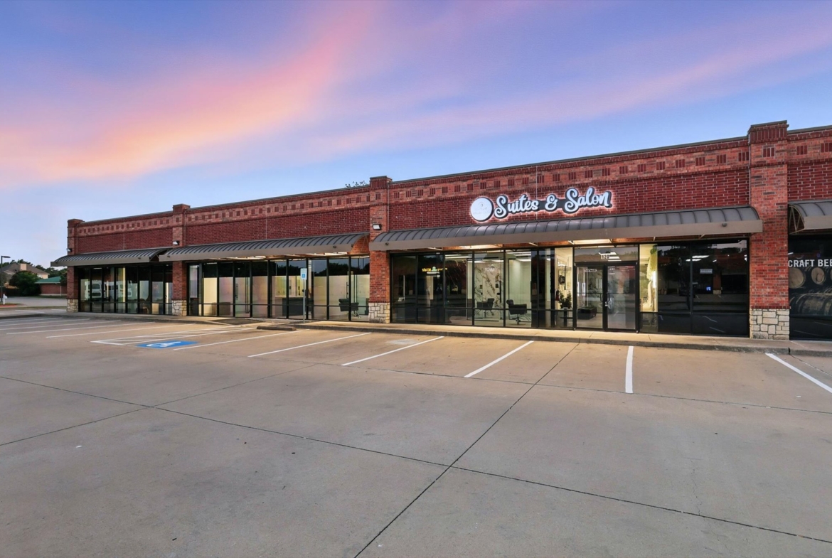 Bright, modern salon space available for rent with glass windows and inviting atmosphere.