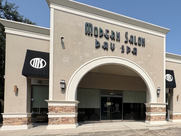 Elegant day spa facade with modern signage, welcoming atmosphere, perfect for salon rentals.
