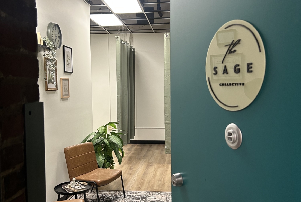 Bright, cozy salon waiting area with stylish chairs, greenery, and wall art.
