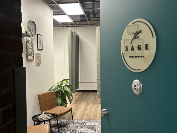 Bright, cozy salon waiting area with stylish chairs, greenery, and wall art.