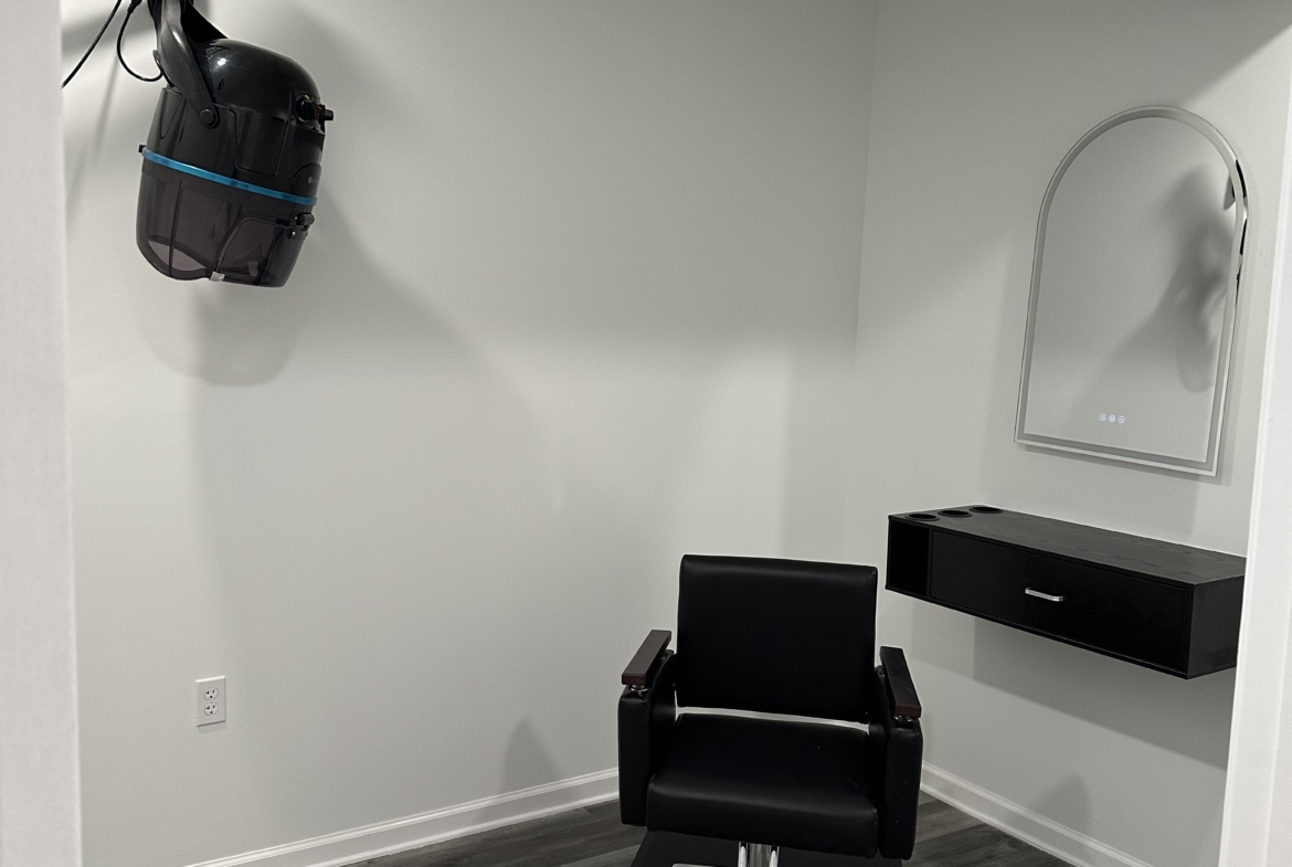 Salon Renter hair salon, professional styling chair, hair dryer, and mirror, ideal for beauty and salon rental services.
