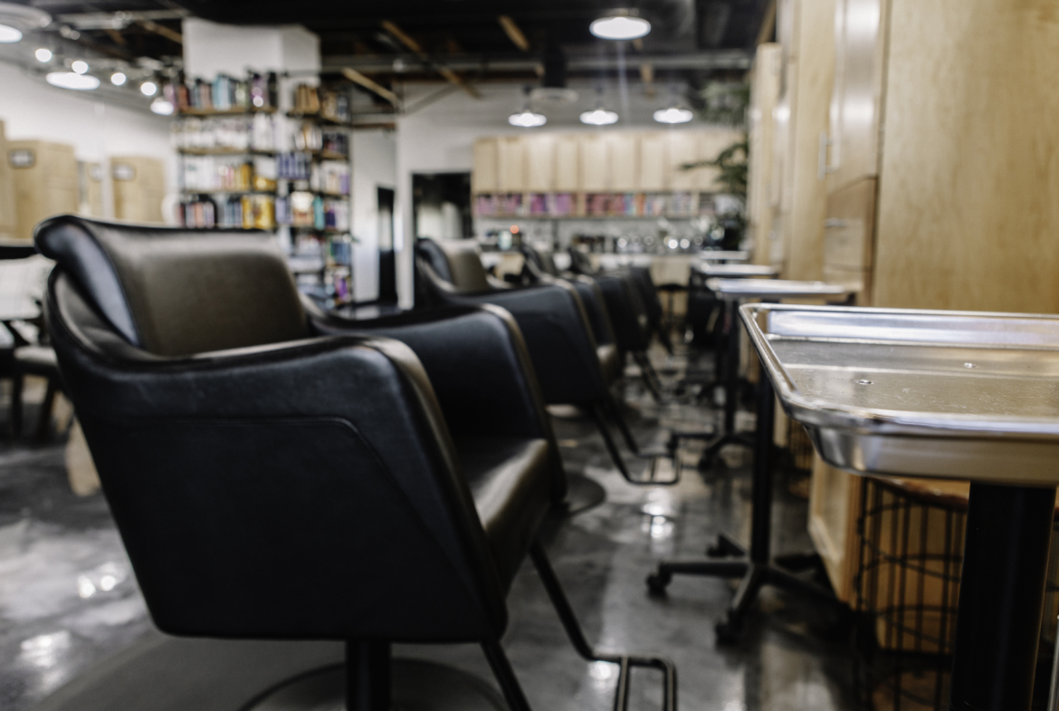Stylish salon chairs with a cozy, organized interior for hair and beauty services.