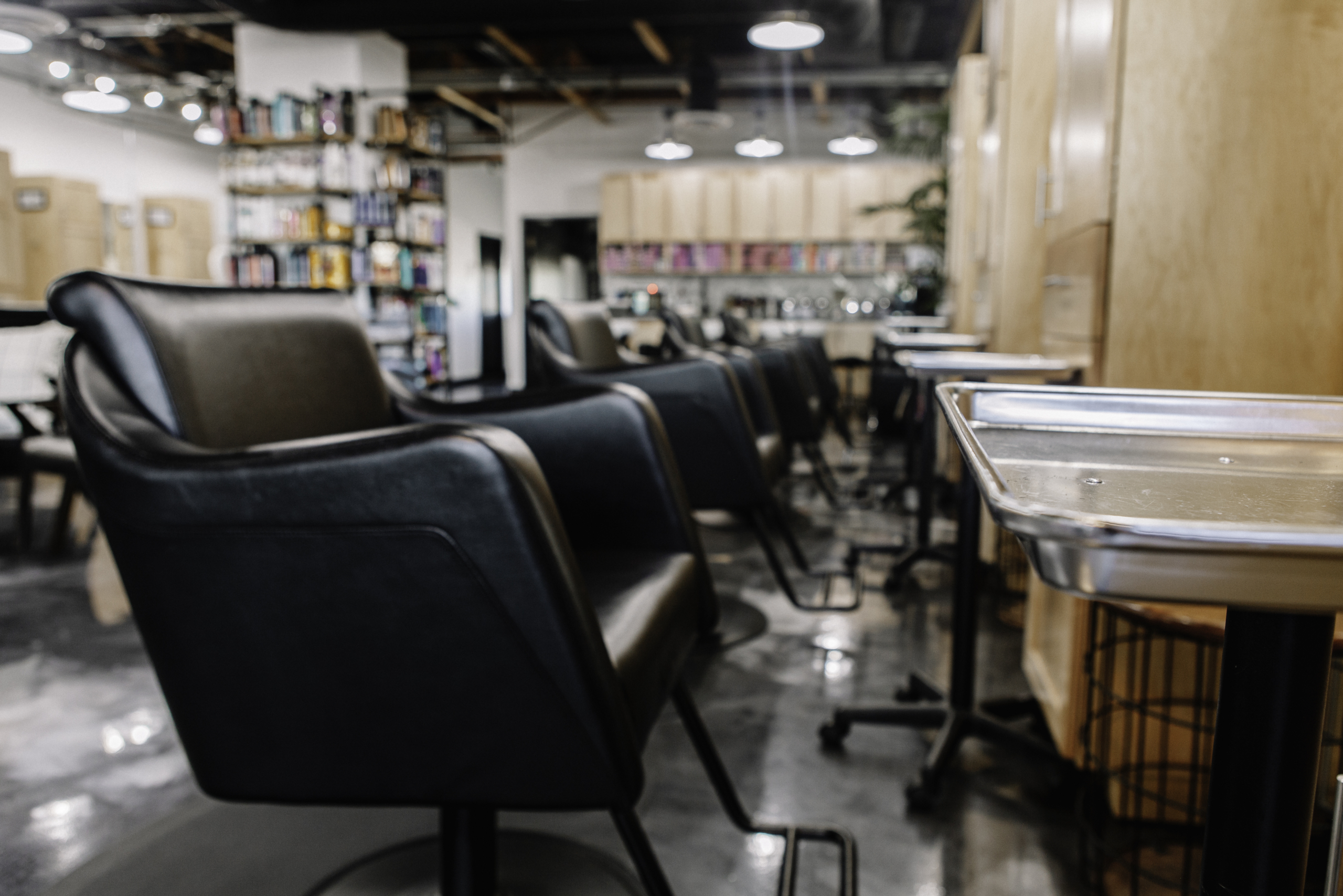 Stylish salon chairs with a cozy, organized interior for hair and beauty services.