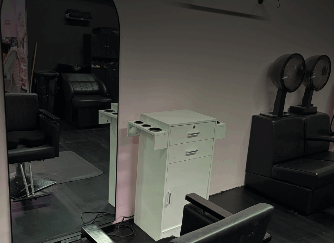 Stylish salon rent space with hairdresser chairs, mirrors, and styling stations for lease.