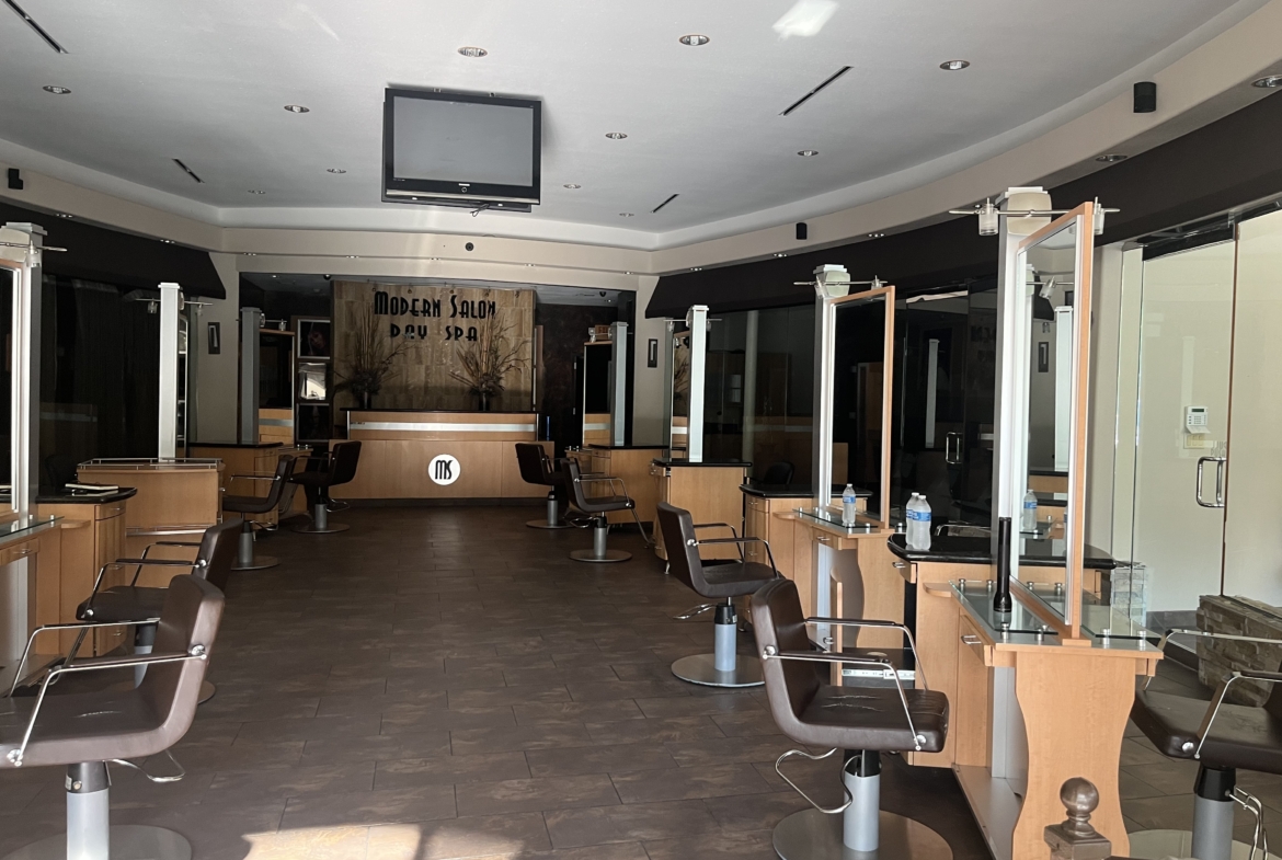 Salon Renter hair studio with spacious stylist stations and modern decor.