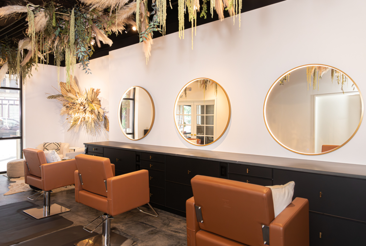 Modern salon rental space with stylish decor and comfortable seating. Perfect for hair and beauty professionals.