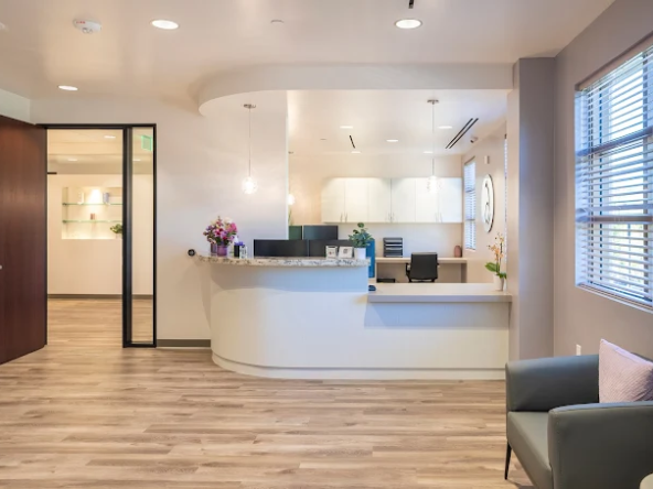 Modern salon reception with bright lighting and welcoming atmosphere.