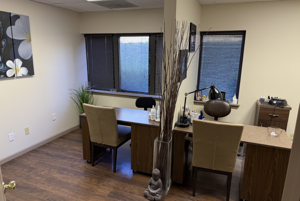 Comfortable professional studio with desks and chairs for salon renters.