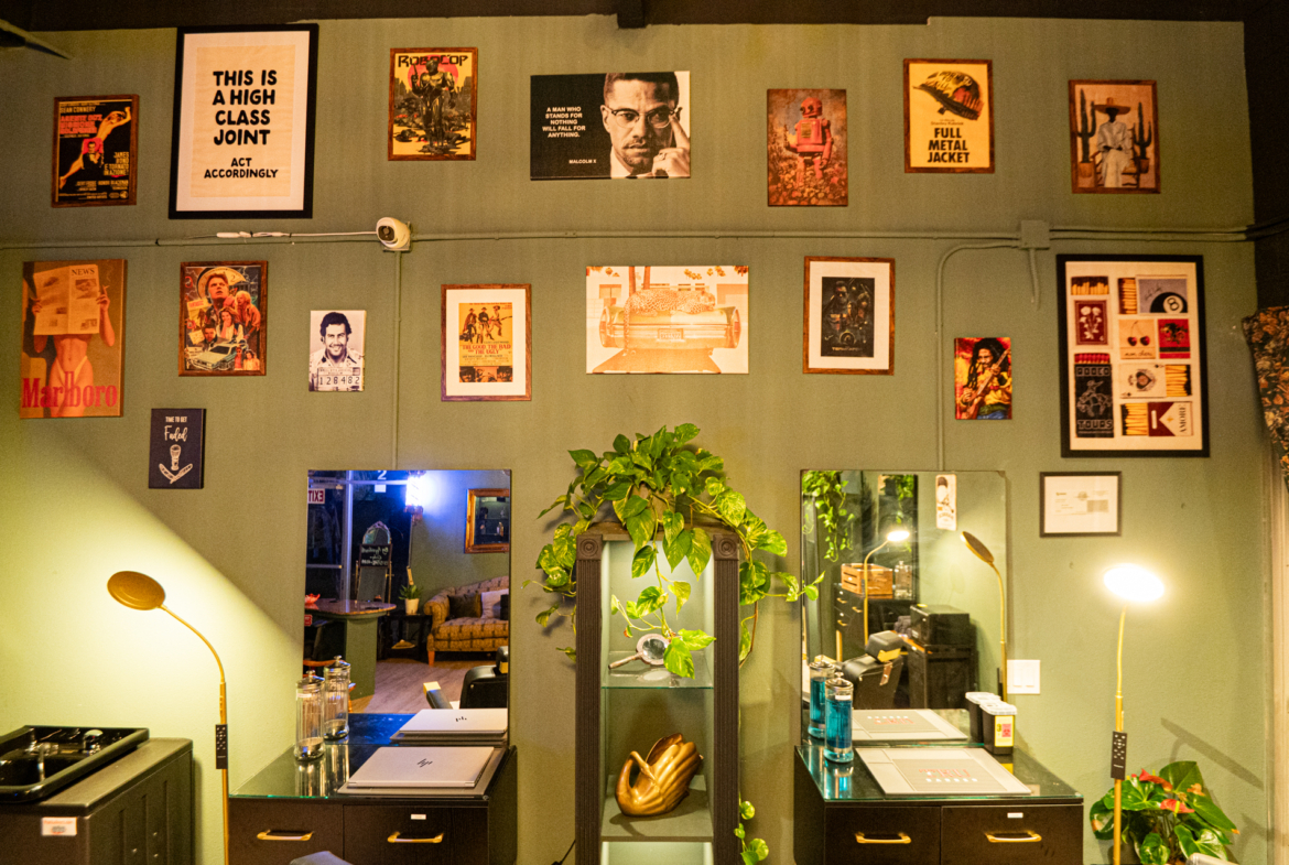 Alternative hair salon interior with stylish wall art and cozy atmosphere, ideal for salon leasing or rent purposes.