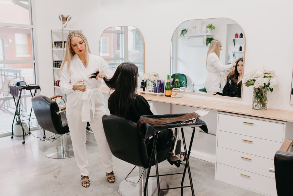 1. Stylish salon interior with hairstylist and client, modern beauty space, Salon Renter.