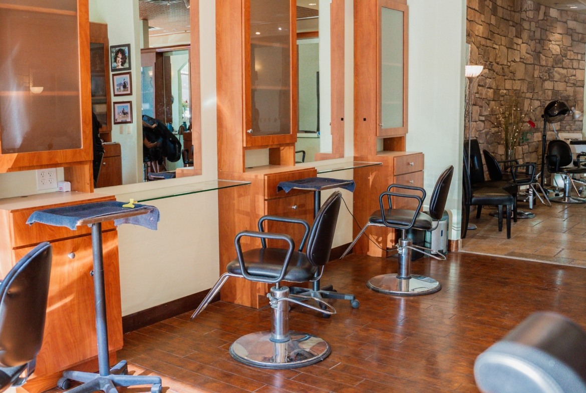 Salon Renter, interior of a professional beauty salon with styling stations and mirrors for rent.