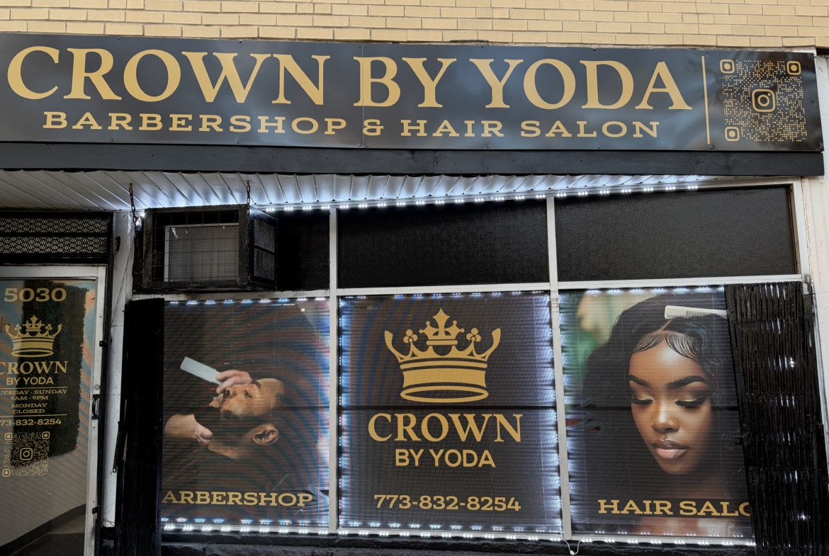 Stylish outdoor sign for Crown by Yoda hair salon and barbershop in bold gold lettering.