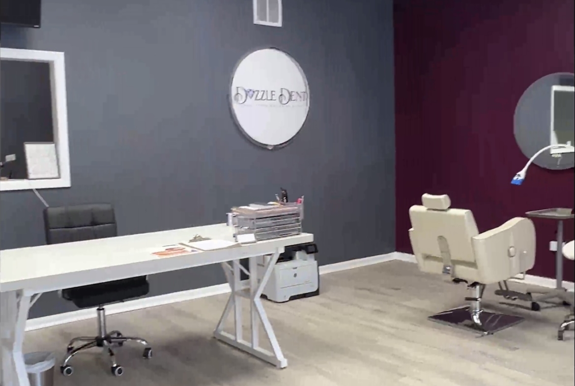 Stylish salon treatment room with modern decor, professional chair, and workspace for clients.