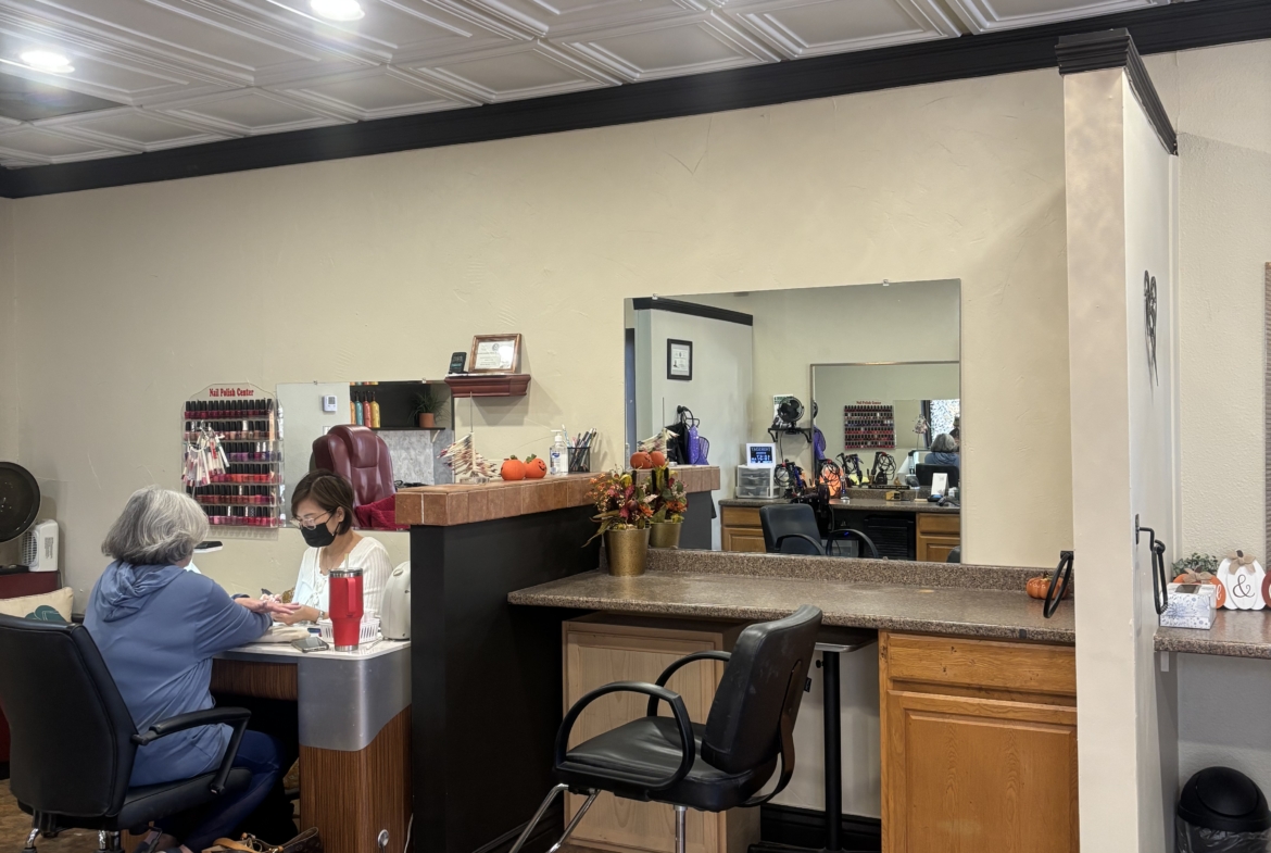 Beautiful Salon Renter space with stylish decor, nail station, and welcoming atmosphere.