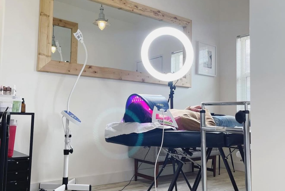 Highly detailed salon studio with professional beauty setup, LED ring light, and equipment for rent.