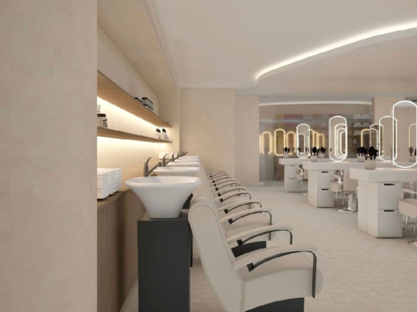 Elegant spa-like salon with chic seating, contemporary lighting, and clean aesthetic.