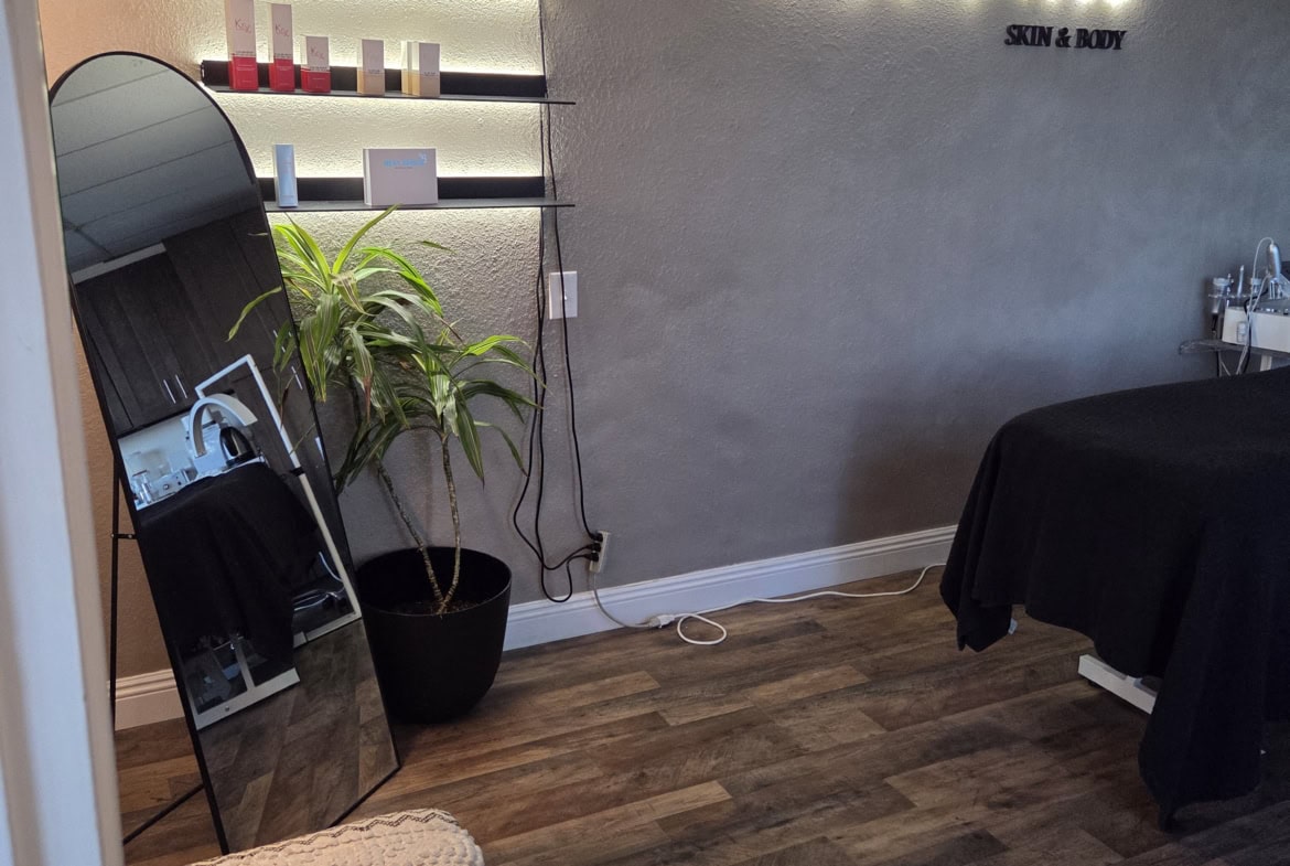 Relaxing skincare treatment room at Salon Renter with modern decor and professional setup.