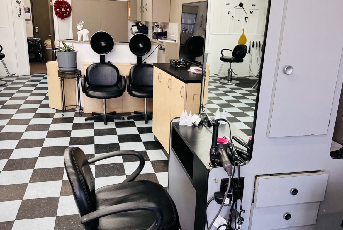Salon Renter salon interior with styling stations, chairs, and professional hair equipment.