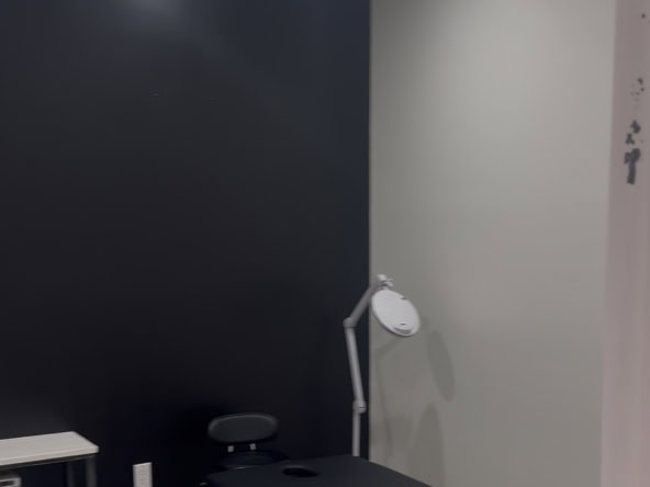 Modern salon treatment room with professional equipment and clean, stylish decor.