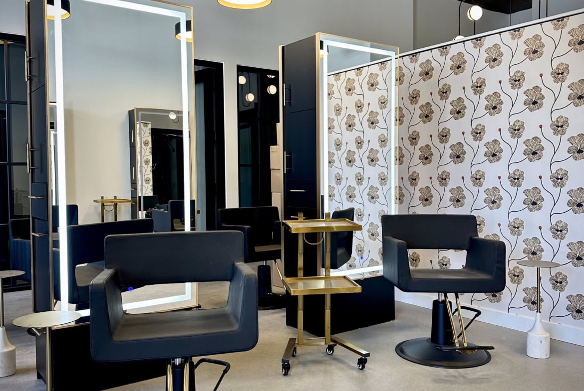 Stylish salon chairs with modern mirrors in a trendy hair salon | Salon Renter.