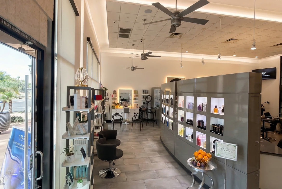 Salon Renter interior showcasing modern styling and retail space.