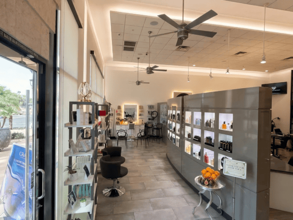 Salon Renter interior showcasing modern styling and retail space.
