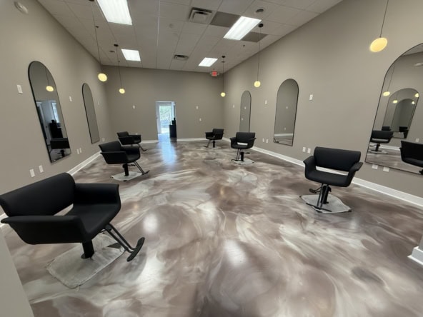 Salon Renter interior with styling chairs, mirrors, and modern decor for hair styling services.