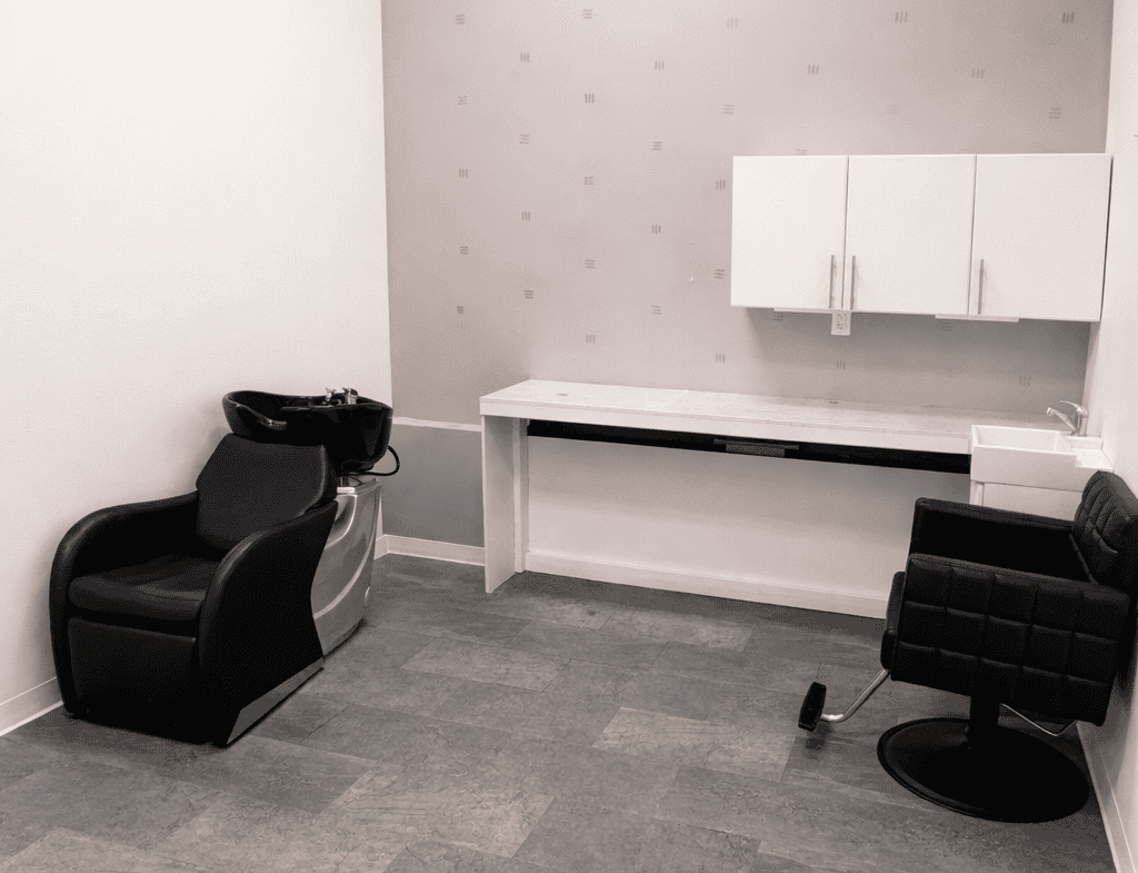 Salon Renter styling room with chairs and workstations for beauty professionals. Perfect space for s.