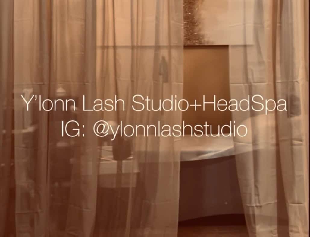 Y'lonn Lash Studio and Head Spa interior with curtains and decor.