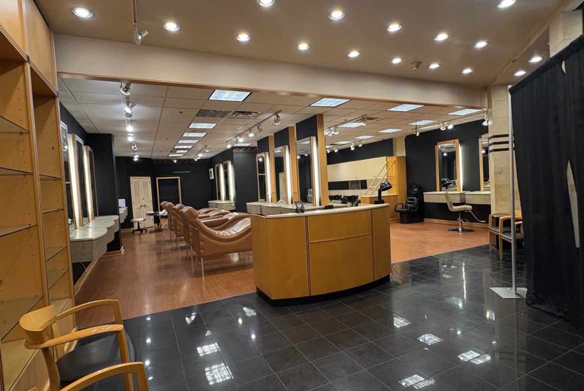 Salon Renter interior showcasing styling stations, chairs, and a welcoming atmosphere for hair and b.