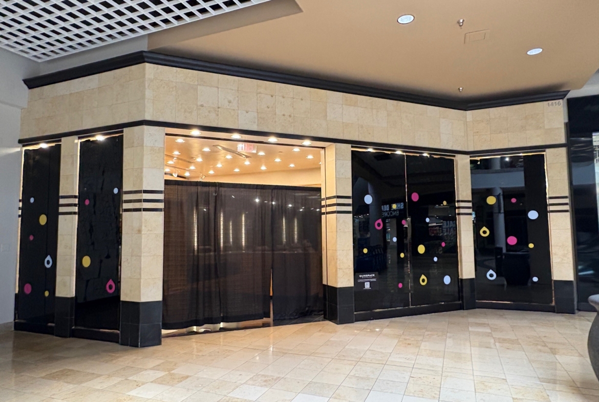 Salon Renter storefront with modern design and colorful dot accents.
