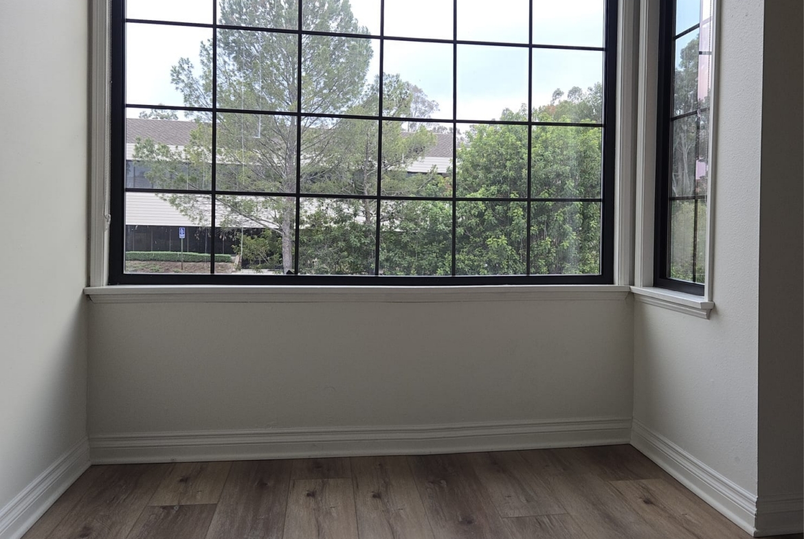 Bright, empty room ideal for salon professionals seeking a rental studio.