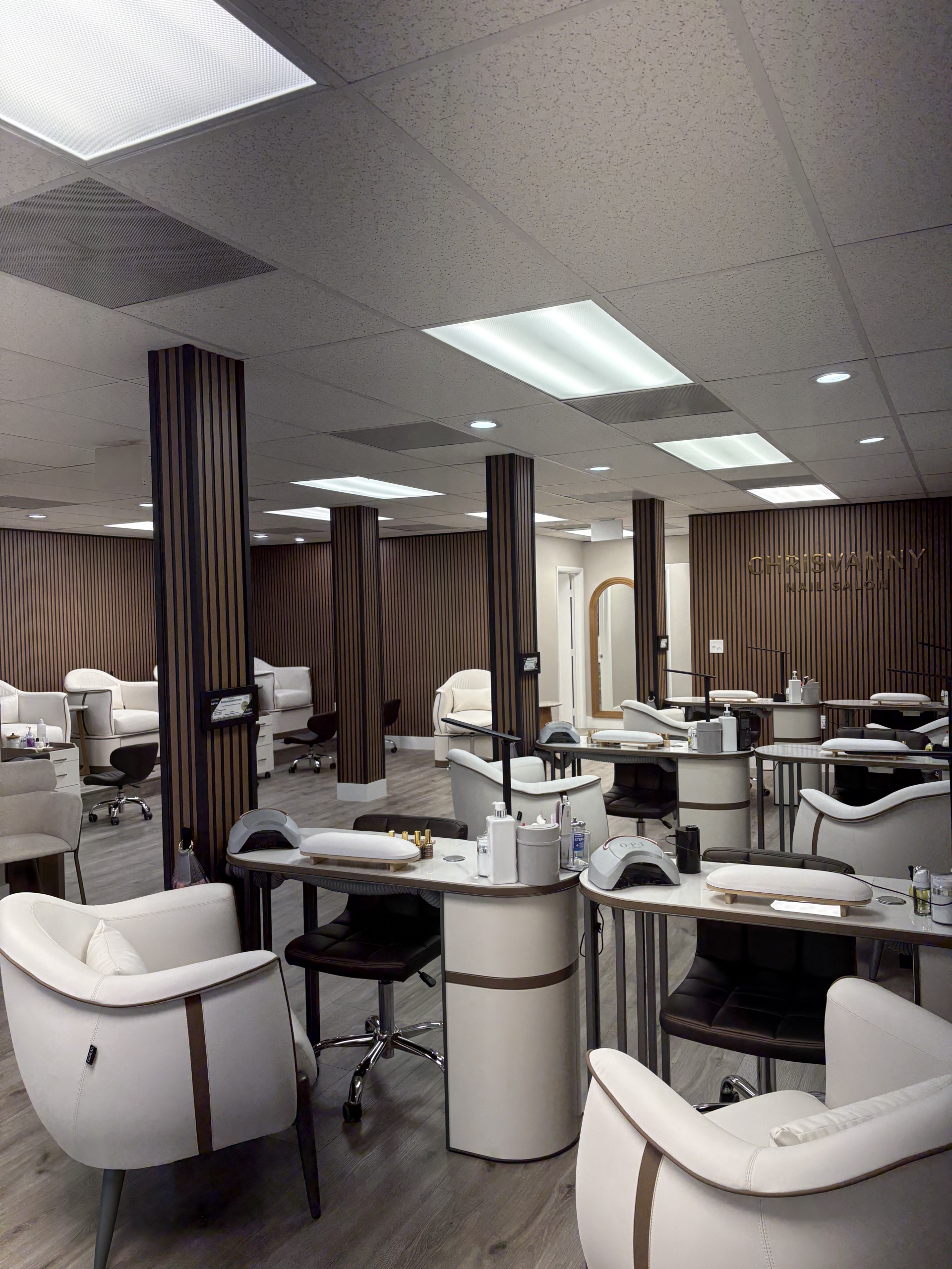 Salon Renter station with comfortable chairs, mirrors, and professional hair styling tools in a slee.