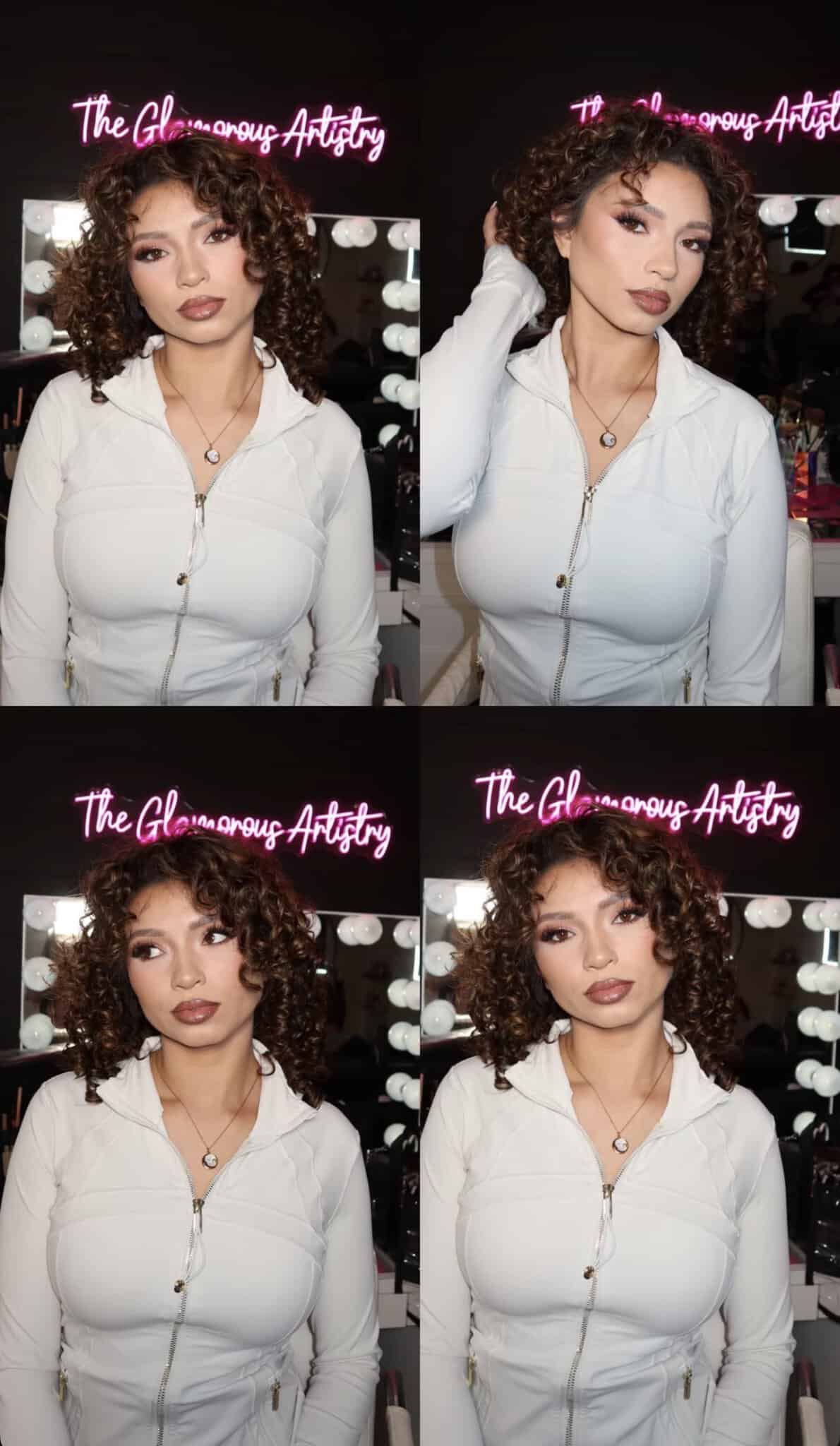 Portrait of a glamorous makeup artist with curly hair in a salon setting.