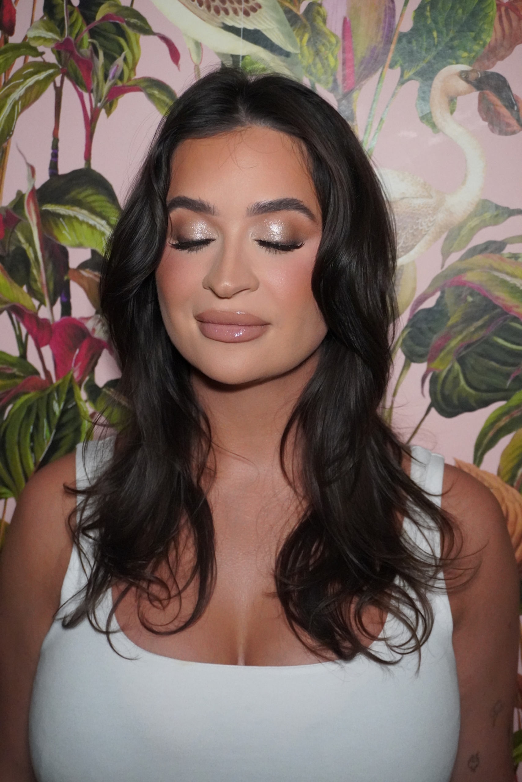 Elegant woman with styled hair and makeup at Salon Renter. Perfect for beauty, hair, and makeup serv.