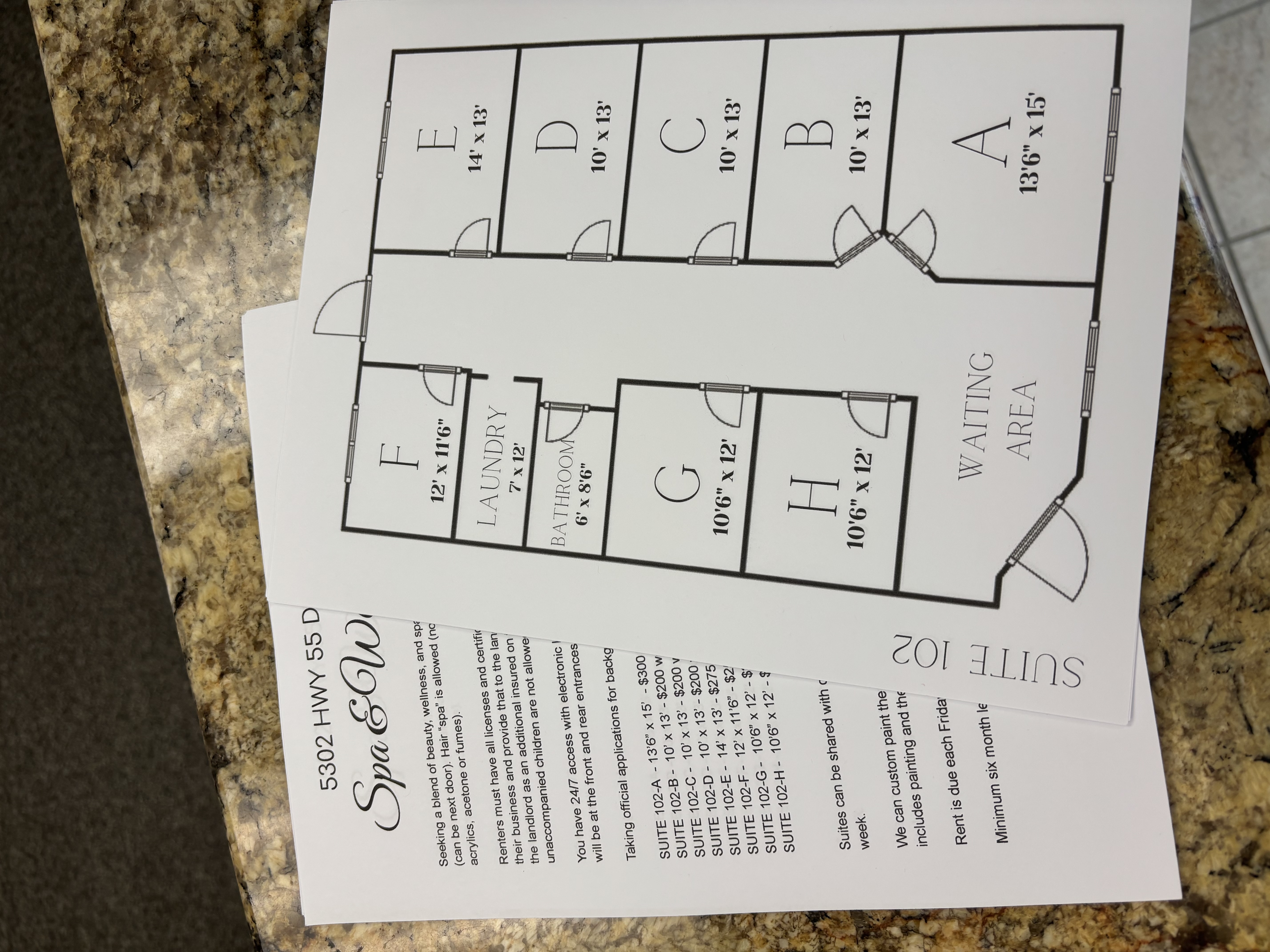 Floor plan of a salon with designated areas for laundry, bathroom, waiting area, and multiple salon.